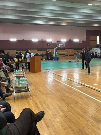 A wide shot of the opening ceremony for the Inter-Faculty tournament inside the sports complex. This shows the scale of the event and our ability to manage a large gathering of students and faculty.