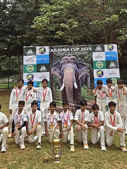 The victorious Playsmart U12 team with their championship trophy at the Arjuna Cup 2024.