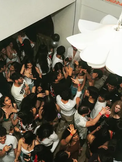 An overhead view of a packed party. When the dance floor is this crazy, you know I'm on the console.