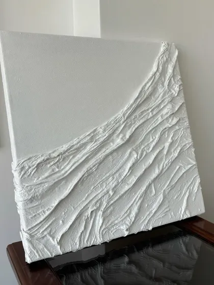 I'm always trying new things. Here's my first attempt at creating a textured canvas using fabric. I love the wave-like effect it creates.