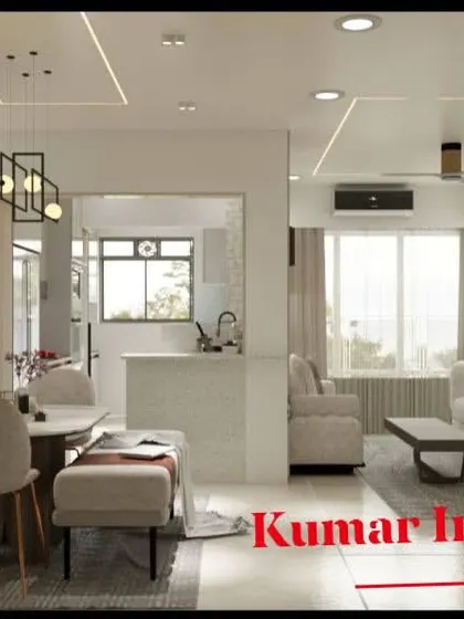 A view across the living and dining area, showing how we use furniture placement and lighting to define different functional zones in an open-plan home.