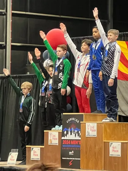 Zac on the podium at Western Nationals, where he earned a silver medal on Pommel Horse.