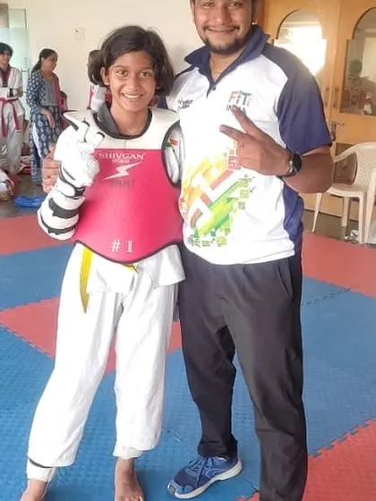 Celebrating with my student Urvi Saple after her gold medal win. She fought with great courage and is now selected for the Zonal Championship.