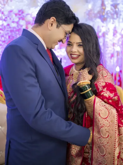 An intimate embrace during the wedding reception, capturing the love and happiness of the newlyweds.