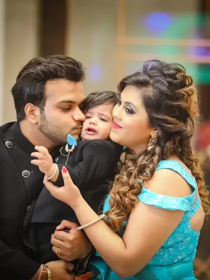 A beautiful family moment, filled with kisses for the birthday boy. We aim to capture the overwhelming love that fills the room on such a special day.