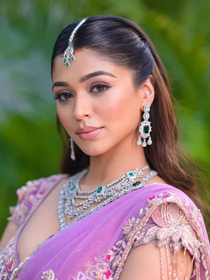 This angle shows how the half up style perfectly showcases the maang tikka. It’s a very popular choice for brides and bridesmaids.