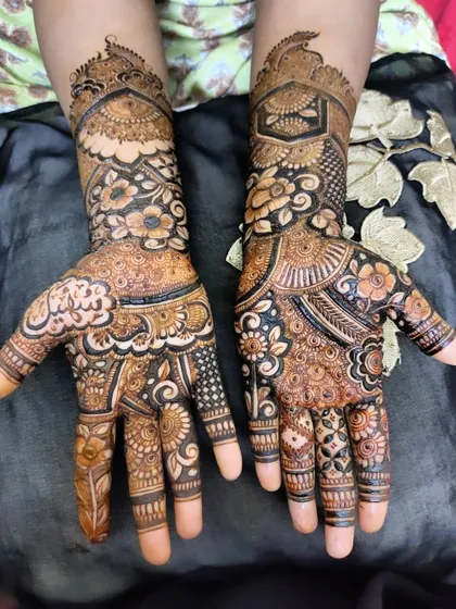 Another view of the beautiful design, showing the full extent of the patterns on the hands and wrists.