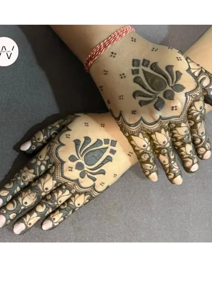 Sometimes, a bold and beautiful lotus is all you need. This design focuses on the lotus as a central mandala, creating a striking and elegant look that's perfect for any celebration, like Diwali.