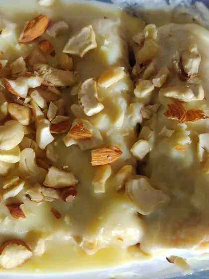 A close-up of the rich, creamy texture of my homemade bread malai roll dessert.