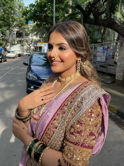 Captured on the street, this photo shows how the makeup and styling look flawless and natural even in bright, direct sunlight.