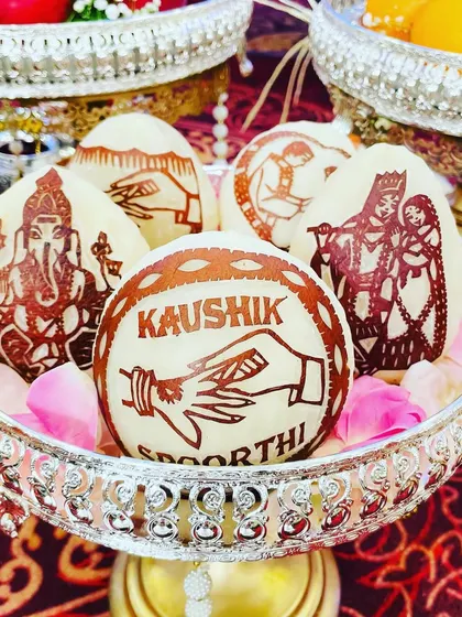 The small details matter the most. I offer personalized coconut carving for engagements and weddings, featuring the couple's names and traditional designs. It’s a unique touch that clients always love.