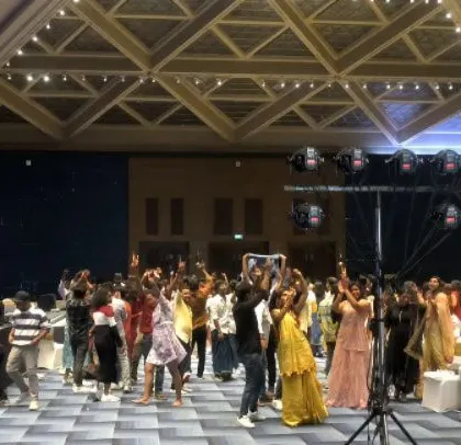 The crowd starts to fill the dance floor at the Logixhealth event.