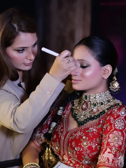 A close-up of the application process during the workshop. Every stroke is precise and purposeful to achieve that flawless finish.