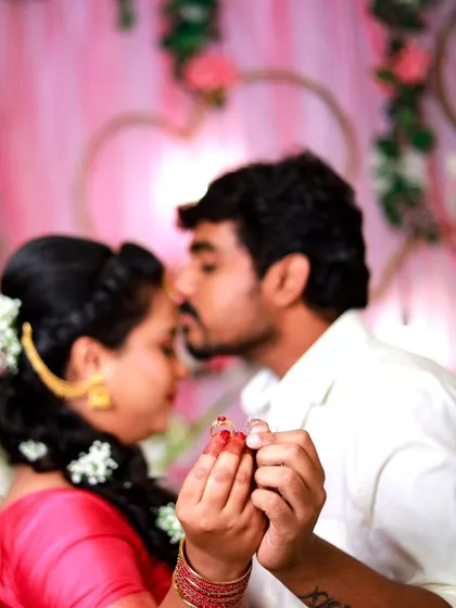 A duplicate of 164, a romantic close-up of the couple holding hands.
