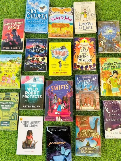 A flat lay of the diverse and exciting books included in the Neev Reading Challenge. We love seeing our shelves stocked with such great literature.