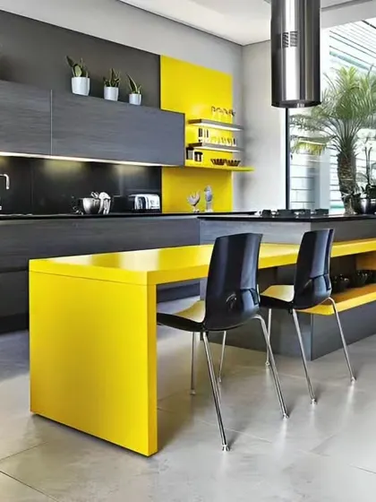 A bold and modern kitchen design with a striking yellow island and breakfast bar. The dark grey cabinetry provides a beautiful contrast, creating a cheerful and energetic cooking space.