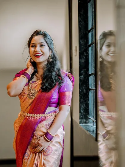 A joyful, candid bridal portrait, capturing a moment of pure, uninhibited laughter.