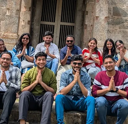 A moment of peace and respect at one of Mysore's ancient temples. The cultural immersion is a key part of the experience.