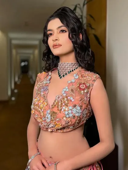 A different take on the Rang look, with a beautifully embroidered peach blouse.