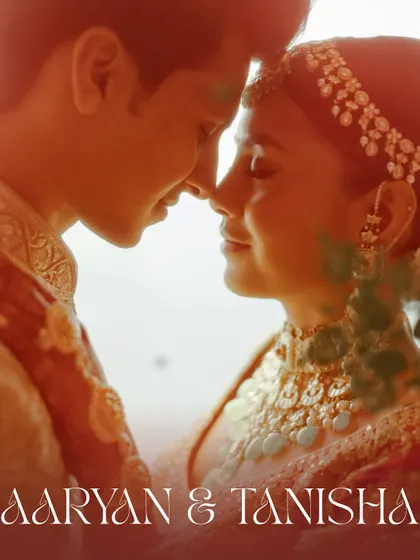 An intimate, sun-kissed close-up of the couple, capturing the warmth and love they share. These are the romantic, dreamy shots that tell a story.
