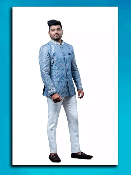 A sophisticated light blue printed Jodhpuri suit, offering a cool and elegant look.
