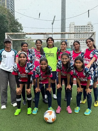 The U16 and U14 girls' teams posing before their match at the Puma x Goequal tournament. This image captures the unity and focus of our players as they prepare to compete together.