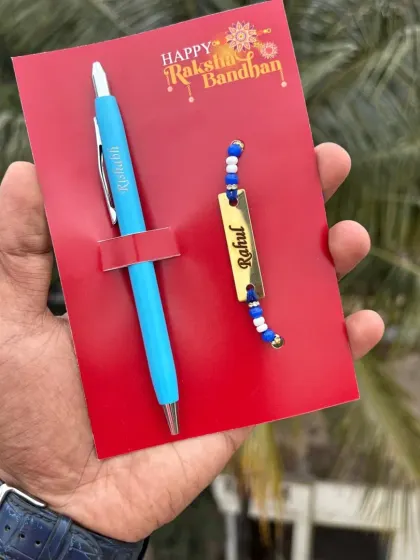 The turbo pen and rakhi combo, featuring a sky blue pen.