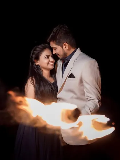 A creative shot using the motion of the fire to create a light trail. This adds an artistic and dynamic element to the night shoot.