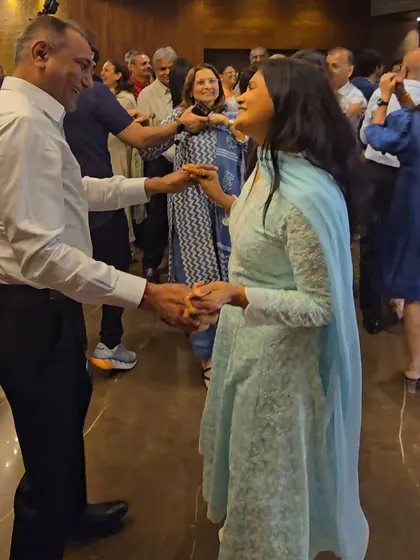 A couple enjoying a dance at the book launch event. My music selection always includes songs for everyone, from dance tracks to romantic classics.