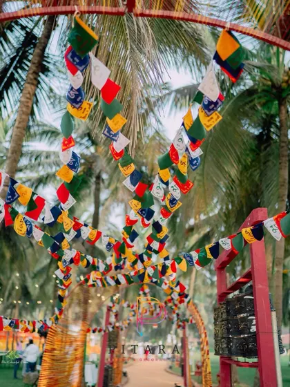 The entrance to the wedding was adorned with colorful Tibetan prayer flags, creating a path of blessings for the couple and their guests.