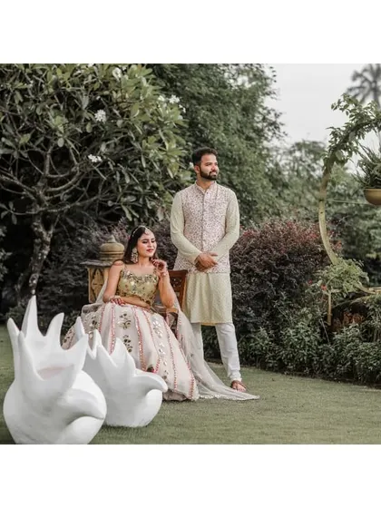 A stylish portrait of the couple at their garden Haldi ceremony in Goa.