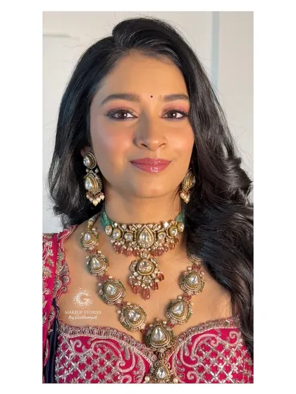 A close up of Mithila's reception makeup. Notice the soft yet defined features, a signature style that I teach my students to create for a luxe, polished finish.