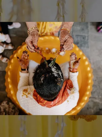 An overhead shot of the Haldi rituals. This angle provides a different view of the traditions and the vibrant yellow color scheme.