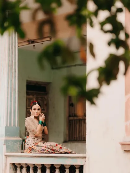 Another beautiful shot of our virtual bride, styled for her intimate wedding. The choice of a light, floral lehenga with minimal jewelry was perfect for the daytime event.