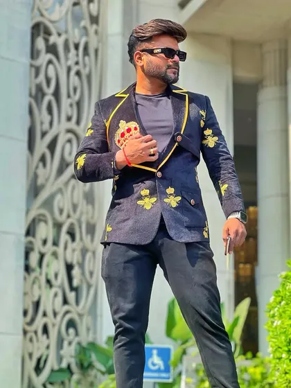 This custom blazer with a crown and bee embroidery is all about elegance and serenity.