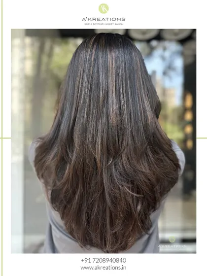 Another angle of the auburn chestnut highlights, showing the beautiful layers and rich tones.