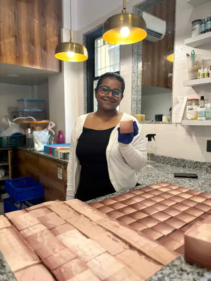 Here I am in my element, surrounded by hundreds of freshly cut soap bars. From a tiny 10x10 studio to this, our journey has been incredible, and it's all thanks to your support for our small, all-girl team.