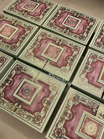 An array of our exquisite, custom-designed boxes for The Belgian Waffle Co. The intricate pattern and high-quality finish reflect the premium nature of the gifts inside.