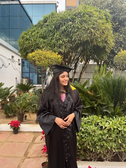 A moment of happiness and accomplishment during my graduation ceremony. This day was a pivotal step towards establishing my practice in cyber law.