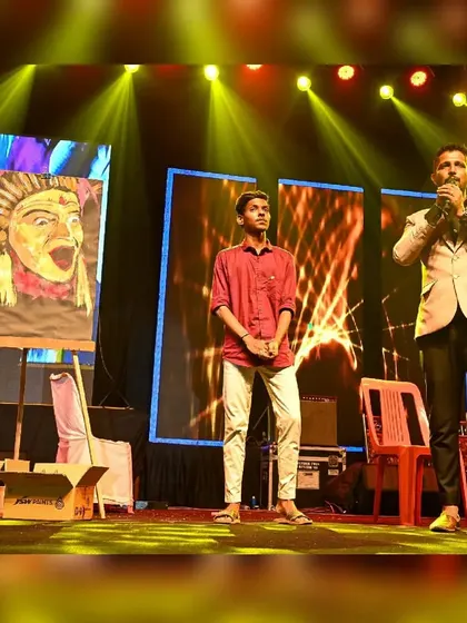 After a performance, I often get to share the story behind the art. Here I am on stage with the host, discussing the Kantara piece and the cultural inspiration behind it.