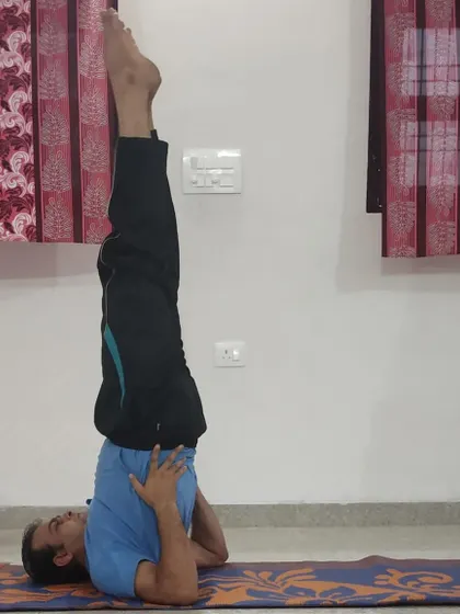 Inversions like Sarvangasana are taught with careful attention to alignment and safety. This posture has numerous benefits for circulation and the endocrine system when performed correctly under expert guidance.