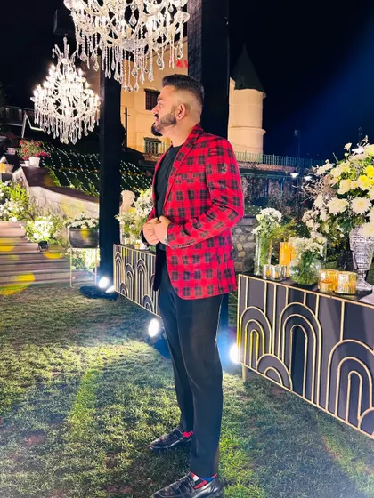 A candid moment before my set at an elegant wedding. I take the time to appreciate the beautiful setup before I bring the beats.