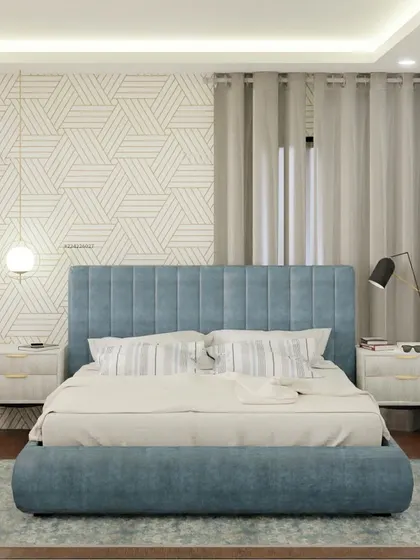 I'm loving the blue trend! This bedroom features a soft blue upholstered bed and a geometric accent wall, creating a calm and modern retreat. The wooden floors add warmth to the cool color palette.