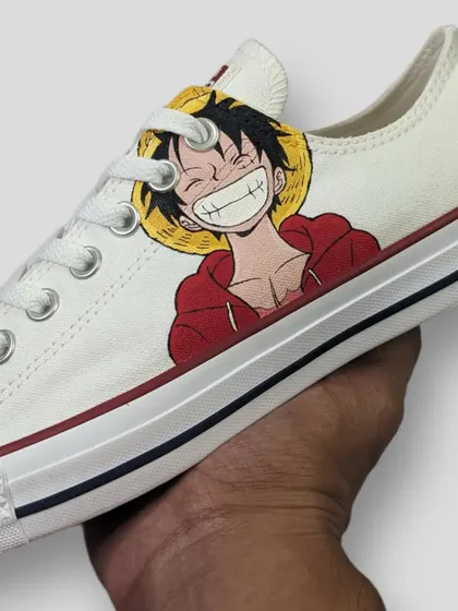 A clean and minimal custom featuring Monkey D. Luffy from One Piece on a pair of Converse Lows. Sometimes a simple portrait is all you need to show your love for a character.