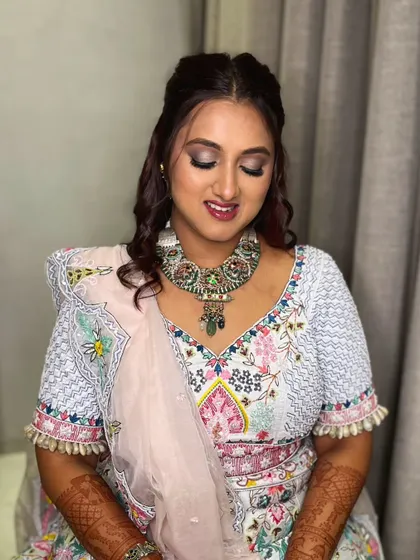 A beautiful look for a wedding guest. The smokey eye and flawless base are perfect for an evening event.