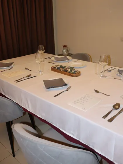 I transform your space into an elegant dining room. A beautifully set table with fine linens, quality glassware, and custom menus awaits you and your guests for an intimate dinner.