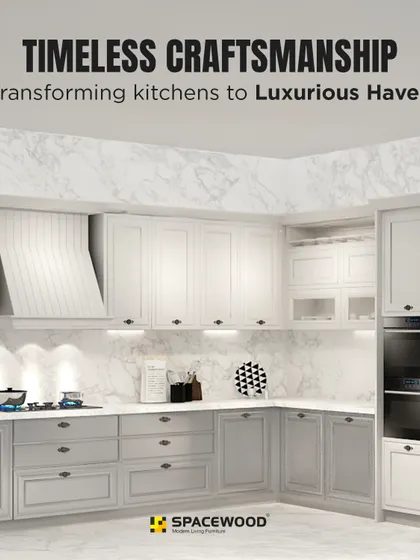 This design showcases timeless craftsmanship in a classic U-shaped layout. The combination of grey and white panelled cabinets, a marble-patterned backsplash, and integrated appliances creates a luxurious and functional haven for cooking.