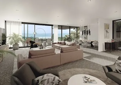 The large living and dining spaces in the Dona Paula homes open up to raised pools and patios. This creates a unique indoor-outdoor connection at all levels, with expansive sea views from the main social areas.