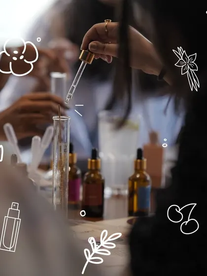 Scents are memories, bottled. In our perfumery experience, you get to be the alchemist, mixing and matching notes to create a fragrance that tells your unique story. This shot shows the careful process of blending.