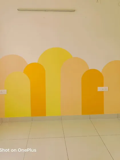 The arch mural shown with the room's furniture, demonstrating how it complements other elements in the space.